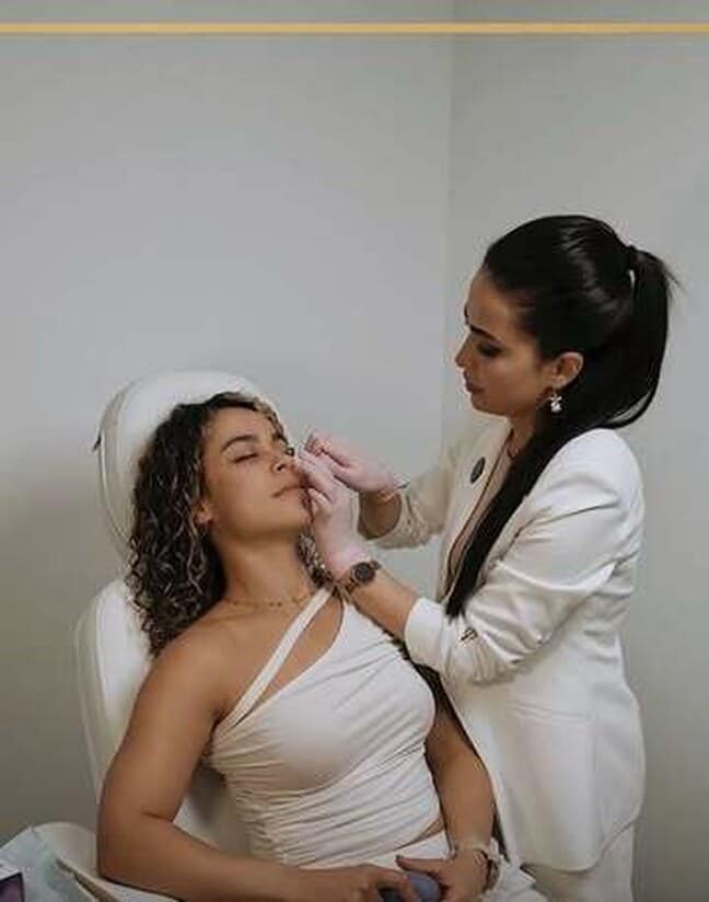 A Muchin Beauty Clinic injector treating a client in the Richmond Hill clinic